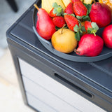 Storage box being used as a table for fruit bowl