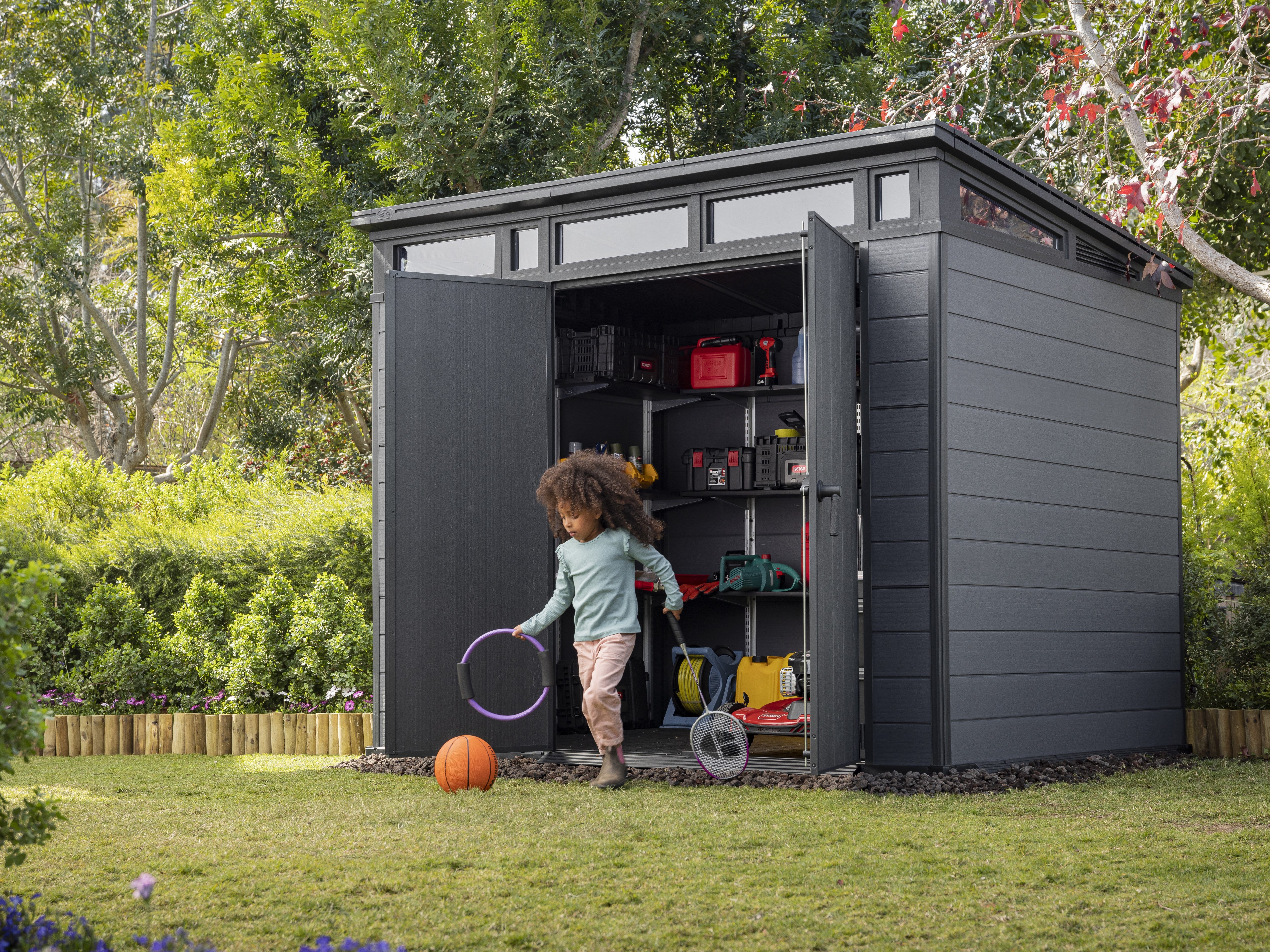 Keter_Cortina_Shed_with_a_child_playing