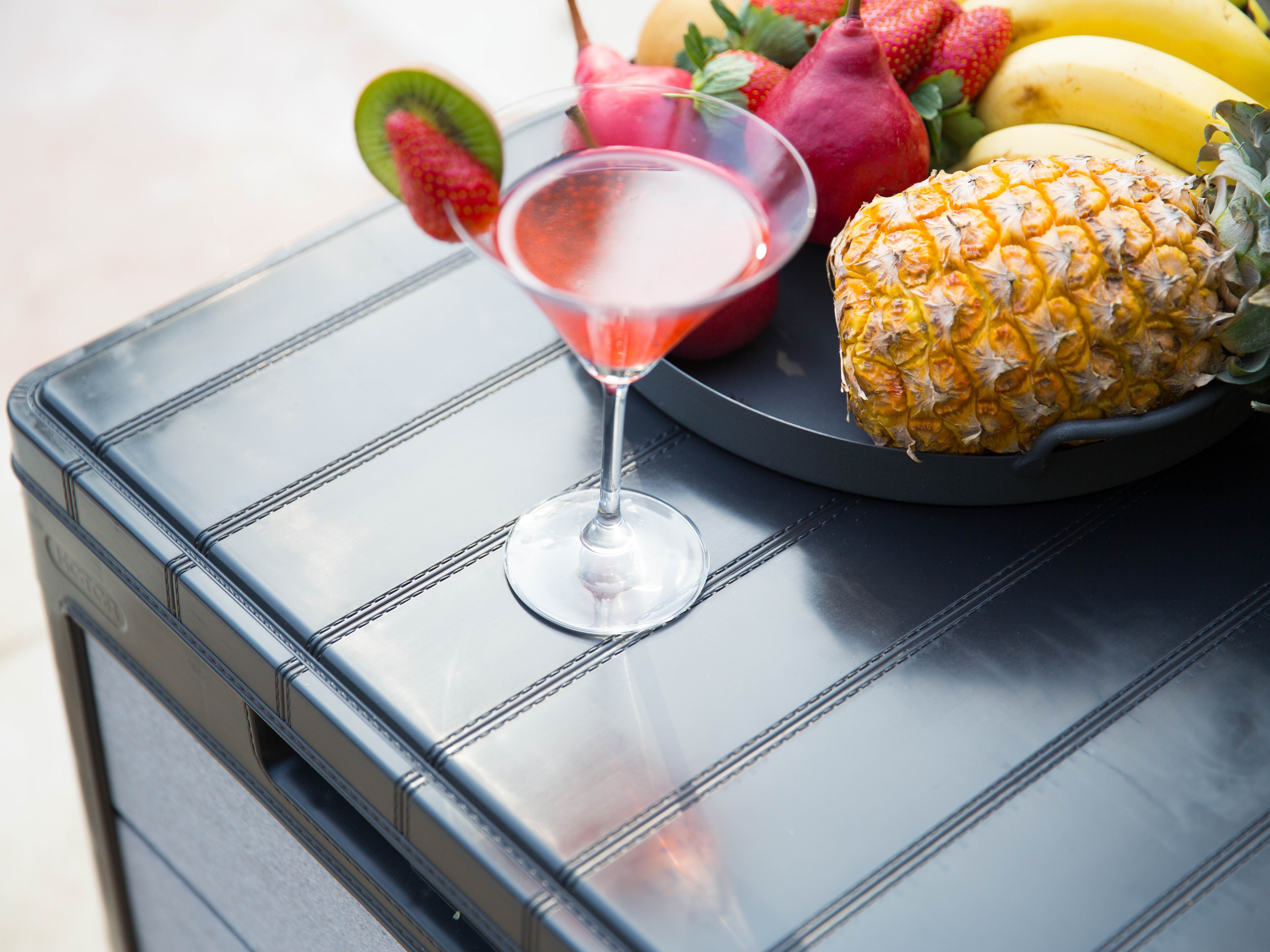 Storage box being used as a table for food and drinks