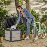 Woman storing her bike helmet in the storage box