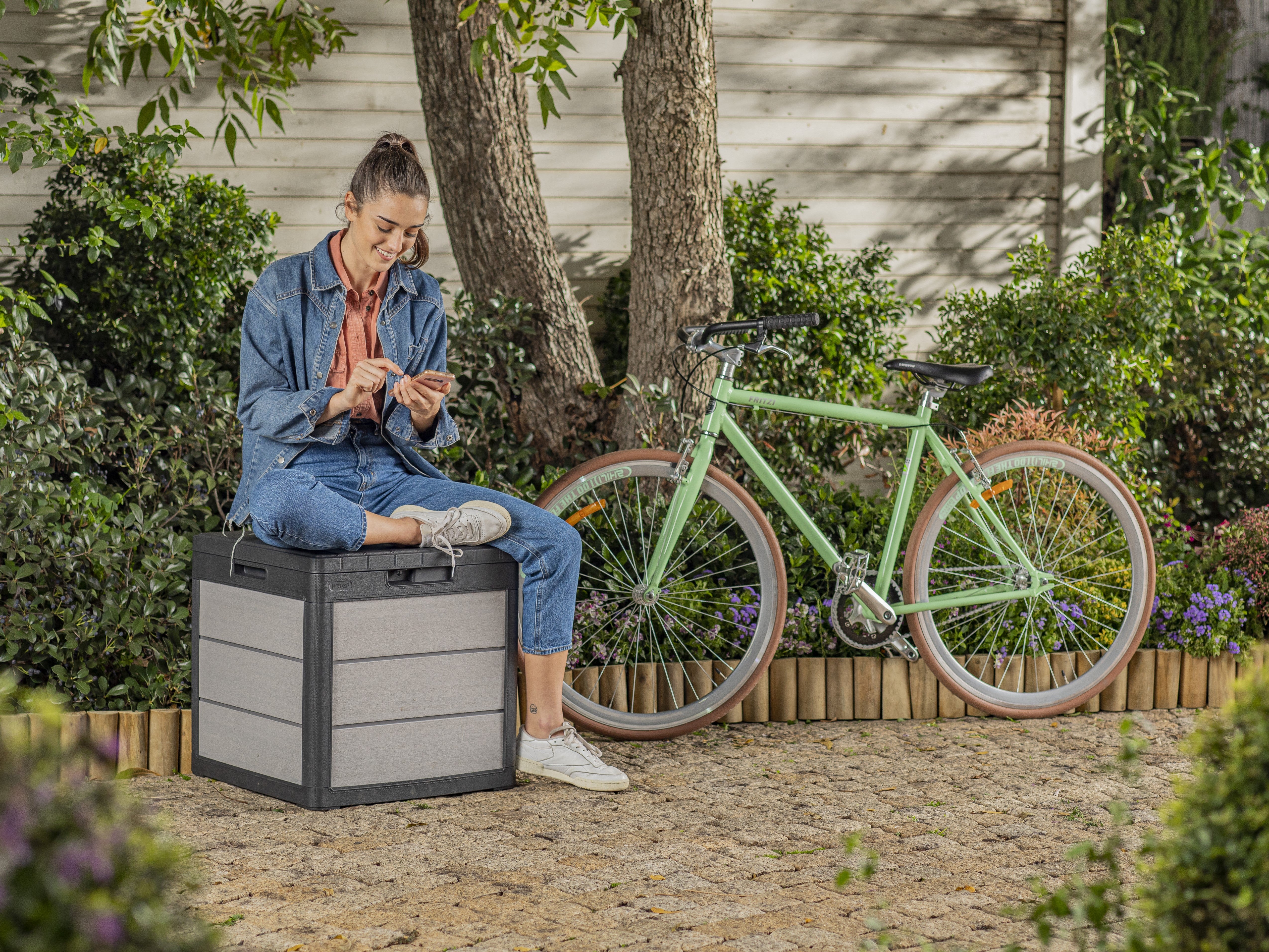 Storage box being used a a seat