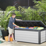 A child getting pool toys out of the Denali Storage box