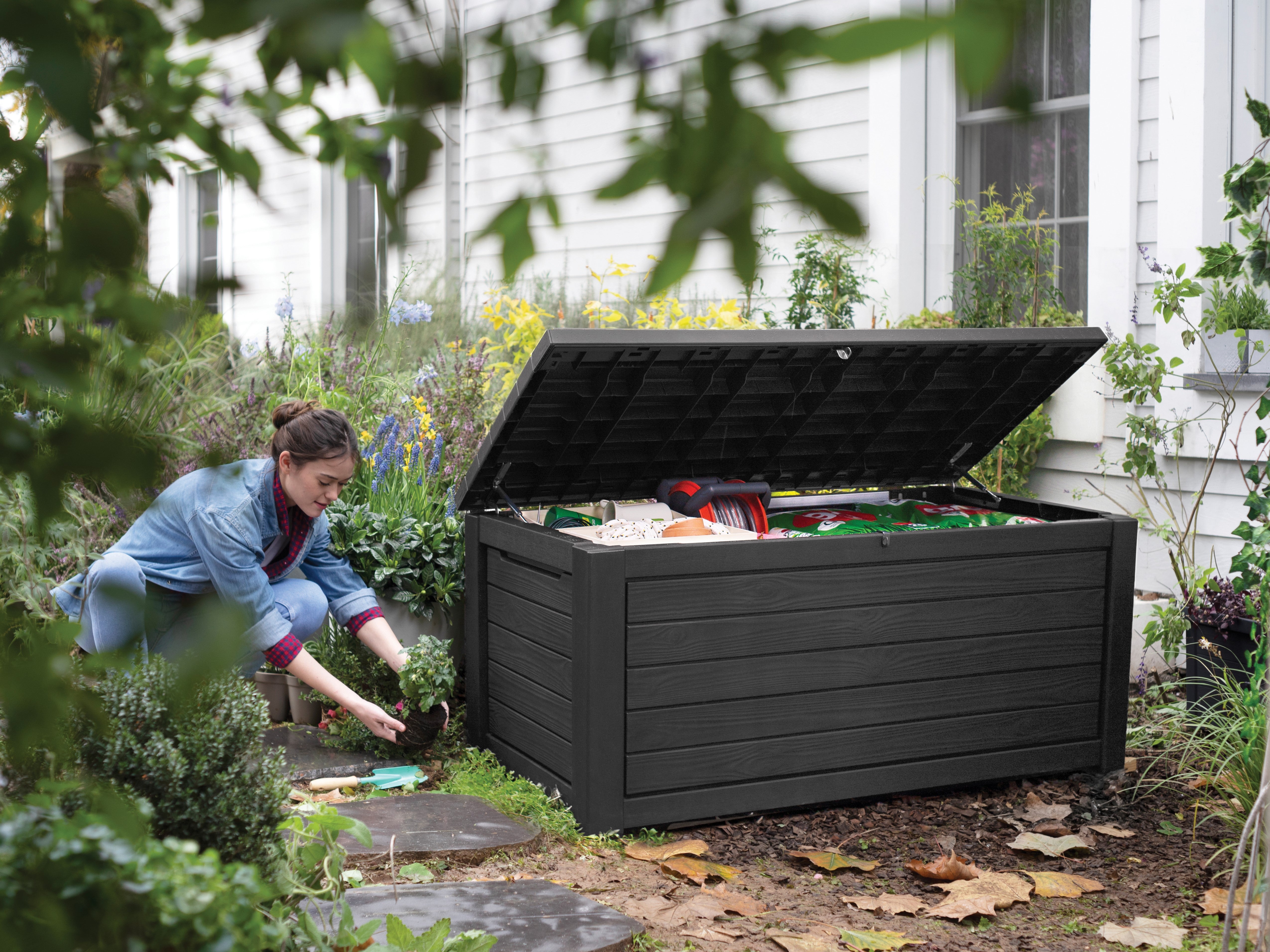 Northwood storage box filled with gardening equipment