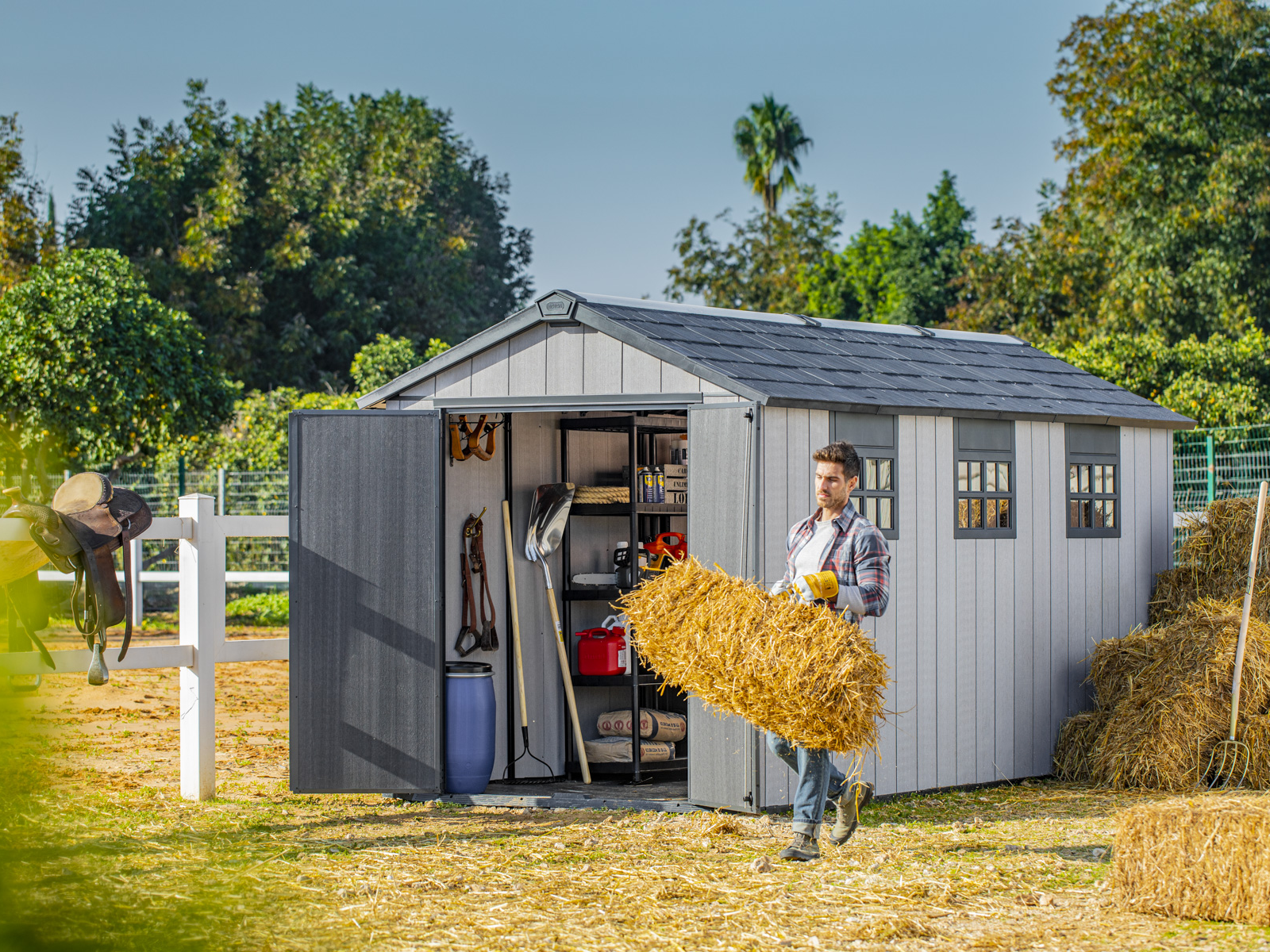 Keter Oakland 7515 shed on sunny day with haybales