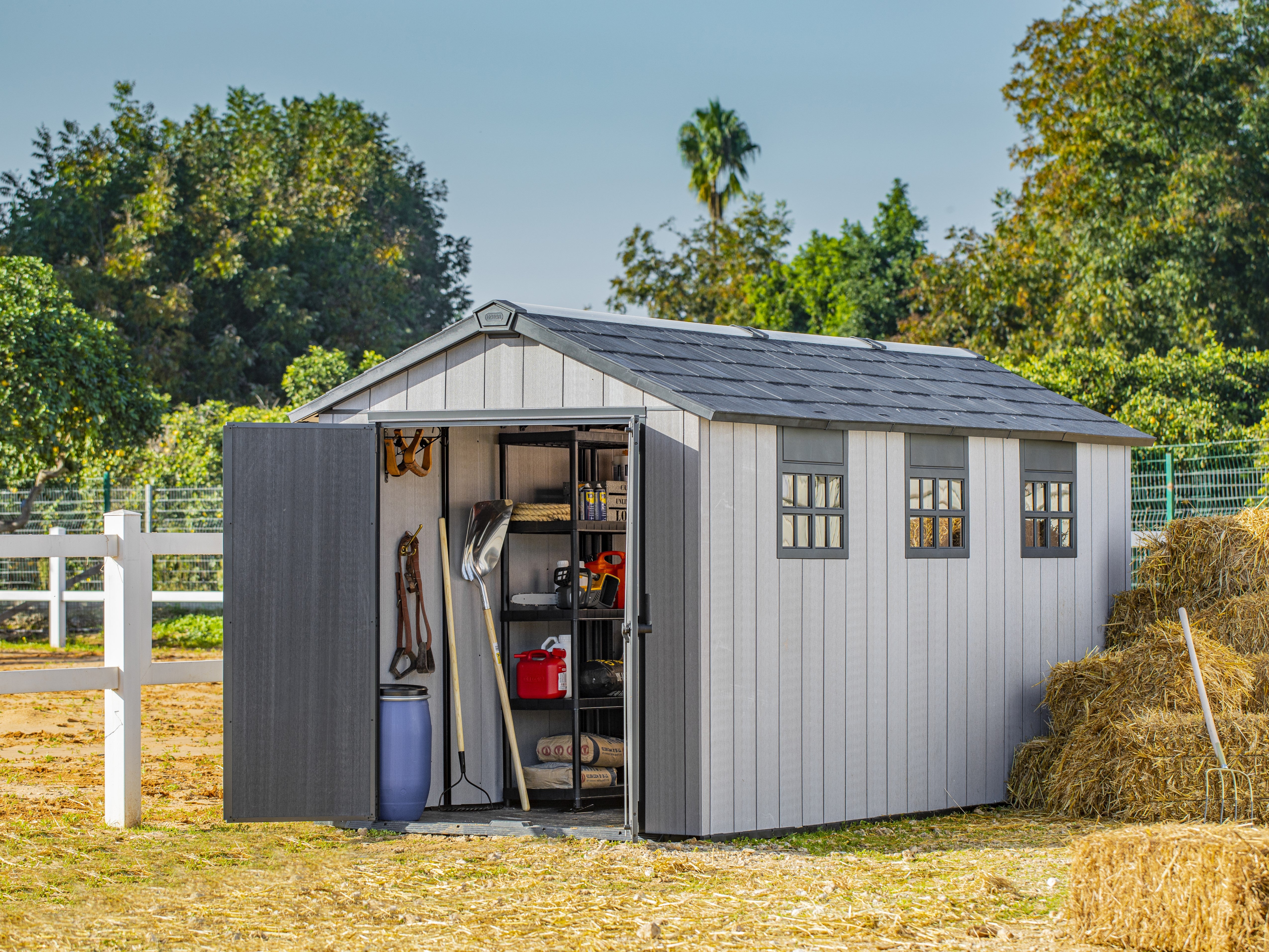 Keter Oakland 7515 shed on sunny day with haybales