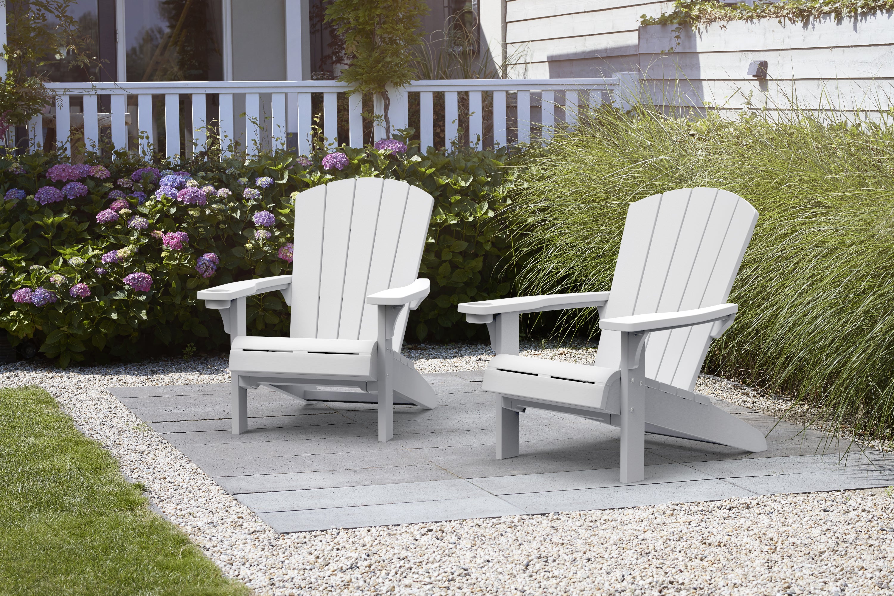 Two Adirondack chairs