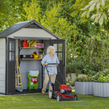 Keter Oakland 754 with woman mowing the lawns