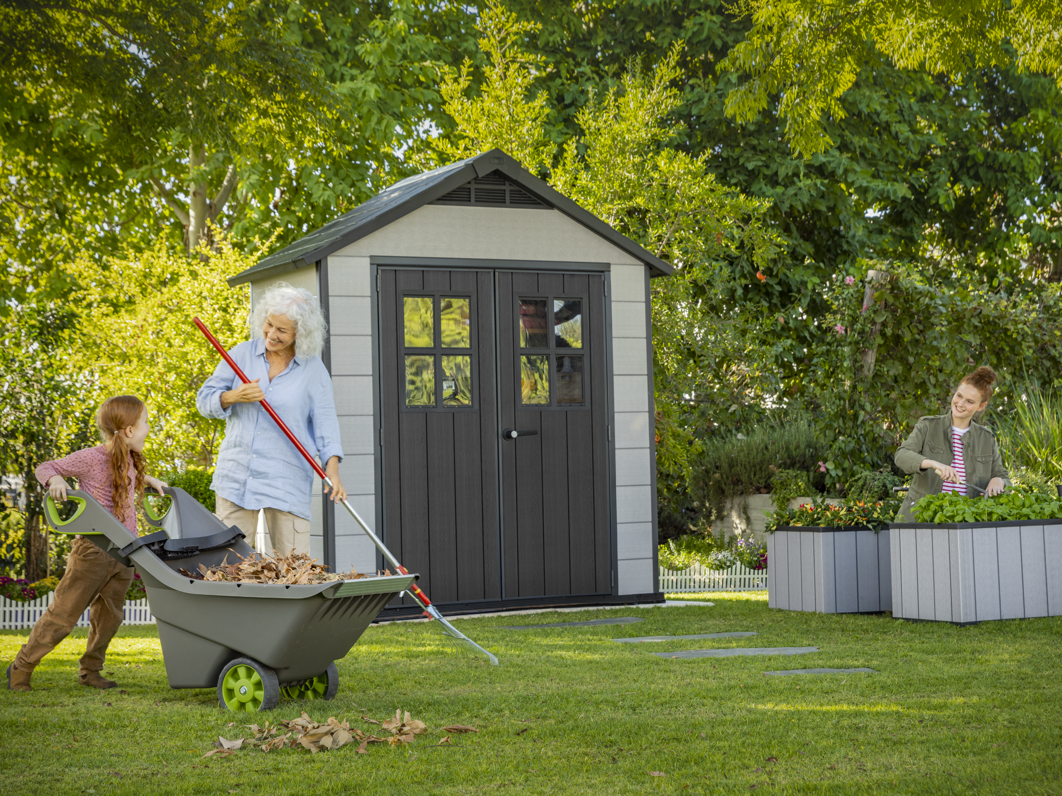 Keter Oakland 754 shed with family gardening