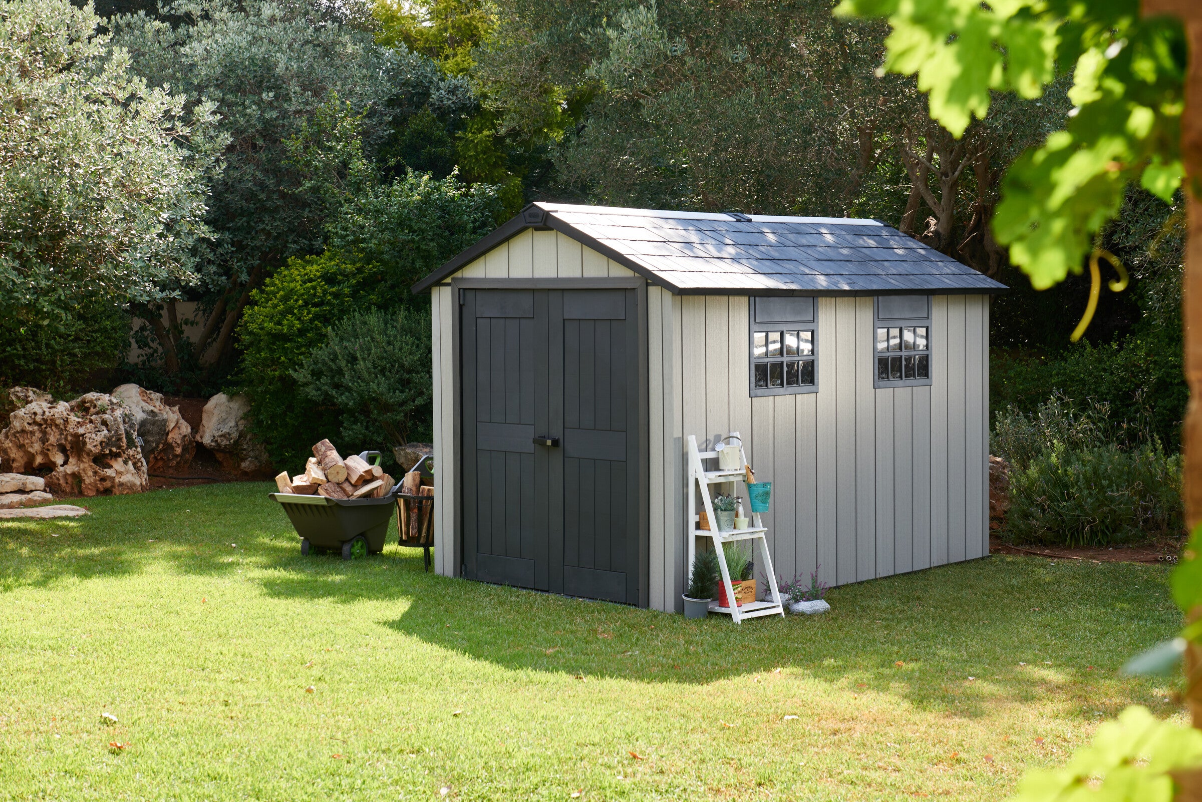 Keter Oakland 7511 Shed in garden landscape