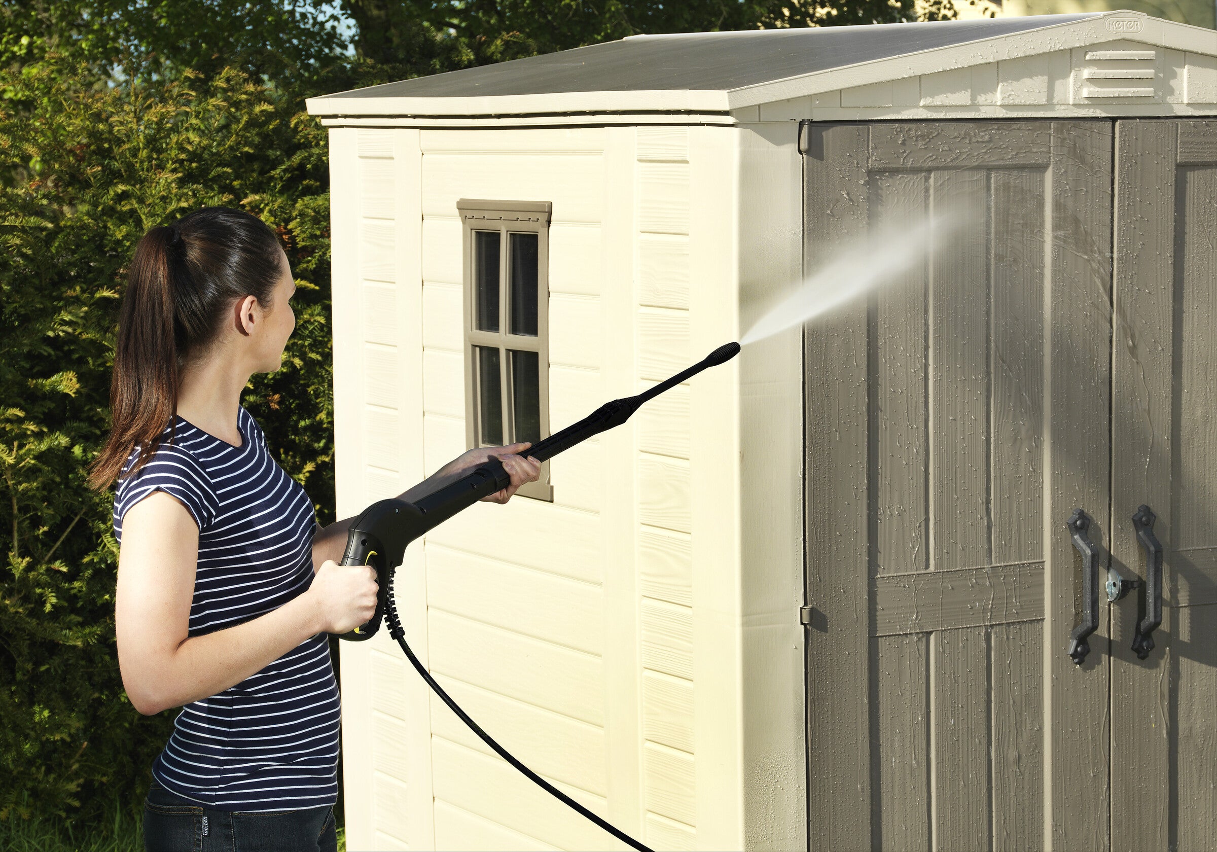 Water blasting the Factor 6x6 shed